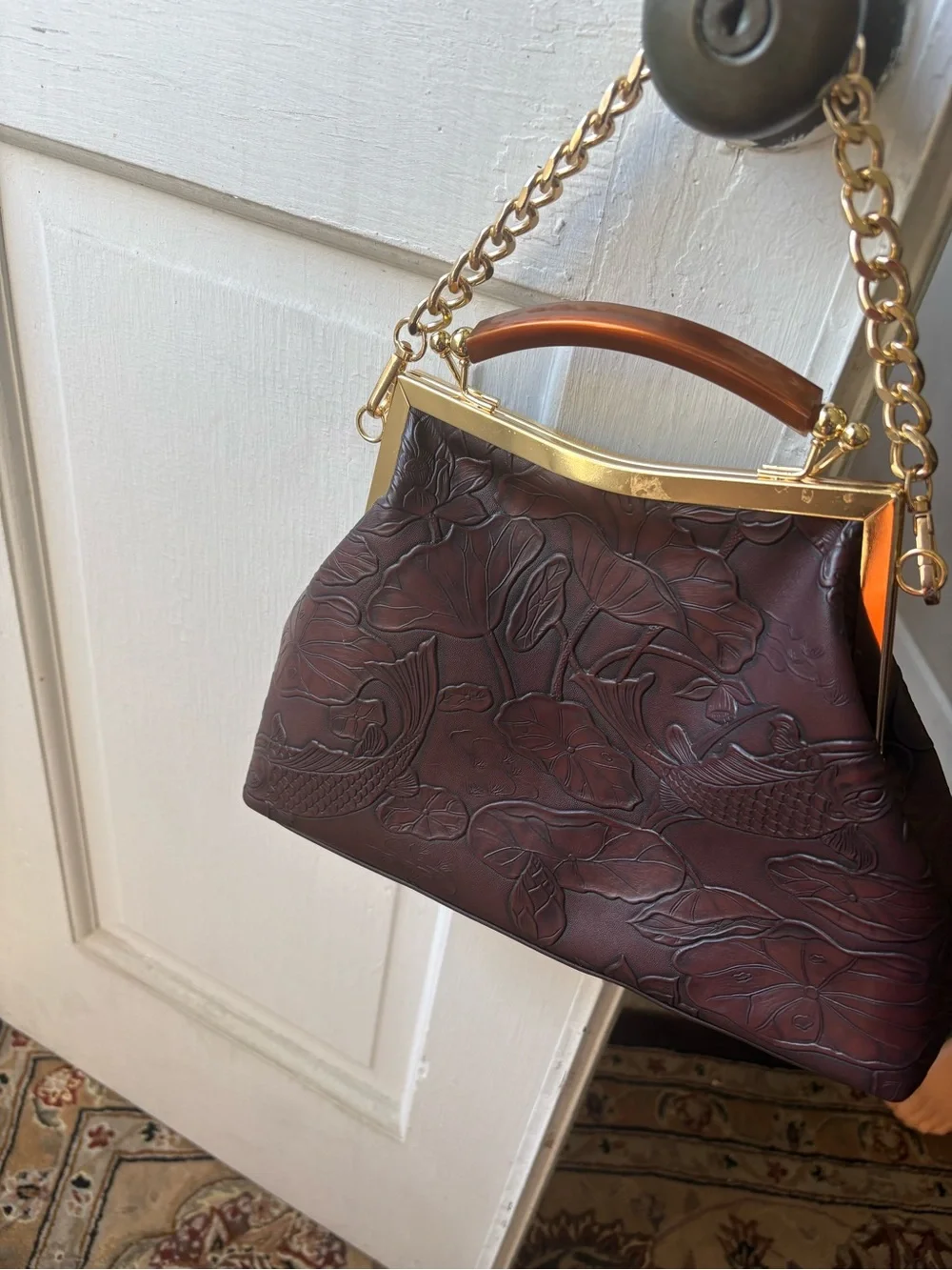 Vintage-Inspired Embossed Brown Leather Top-Handle Bag with Gold Chain